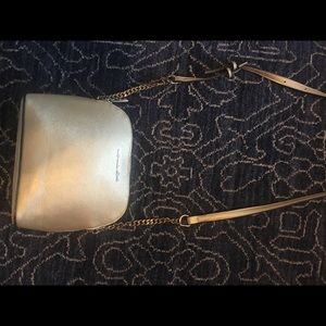 Michael Kors Leather Dome Crossbody Gold.